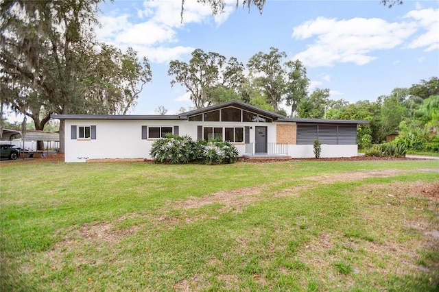 2215 Lake Ruby Rd, Deland, FL 32724 - rear view of property with a yard