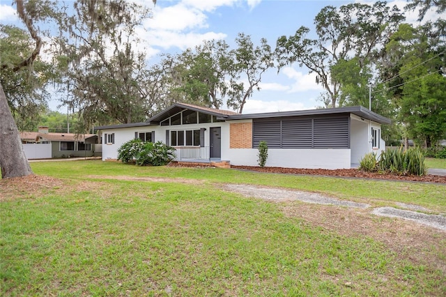 2215 Lake Ruby Rd, Deland, FL 32724 - back of property with a yard