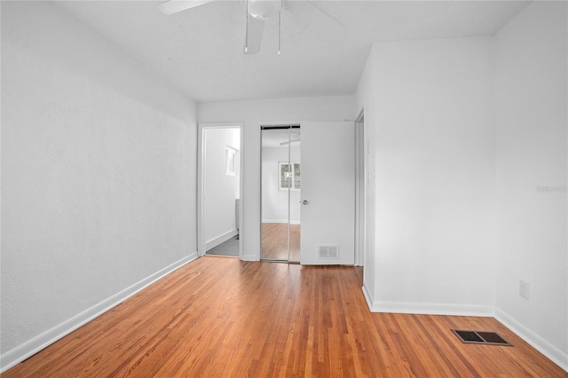2215 Lake Ruby Rd, Deland, FL 32724 - spare room featuring wood finished floors, ceiling fan, and baseboards