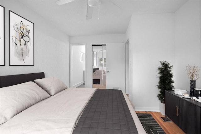 2215 Lake Ruby Rd, Deland, FL 32724 - bedroom with light wood-style floors, ceiling fan, and a closet