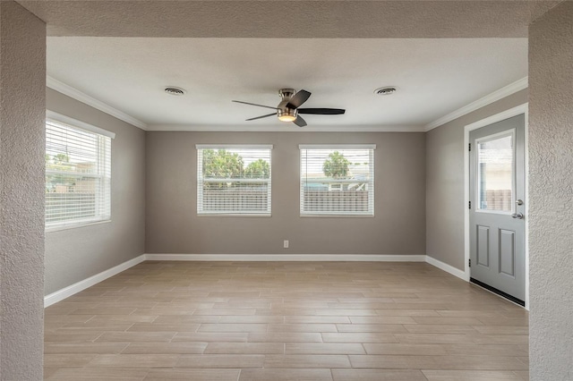 1032 Bel Aire Dr, Daytona Beach, FL 32118 - spare room with crown molding, a ceiling fan, baseboards, light wood-style floors, and healthy amount of natural light