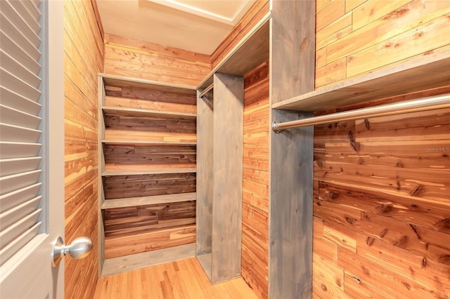 1032 Bel Aire Dr, Daytona Beach, FL 32118 - walk in closet with wood finished floors