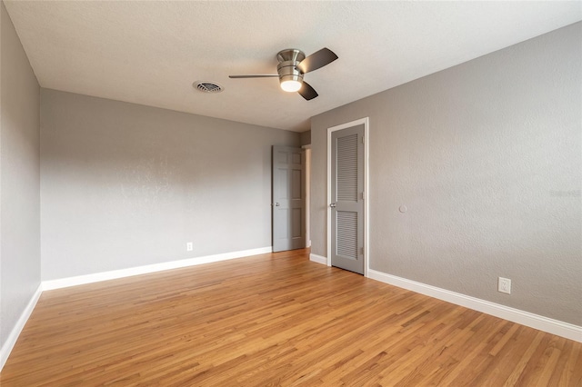 1032 Bel Aire Dr, Daytona Beach, FL 32118 - spare room featuring light wood-type flooring, ceiling fan, and baseboards