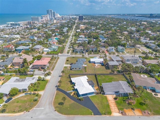 1032 Bel Aire Dr, Daytona Beach, FL 32118 - aerial view of property and surrounding area with nearby suburban area, a large body of water, and nearby urban area