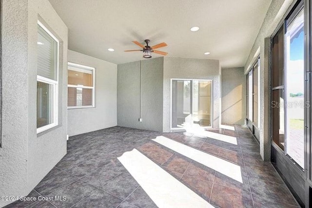 675 Easton Forest Cir SE, Palm Bay, FL 32909 - unfurnished sunroom featuring healthy amount of natural light