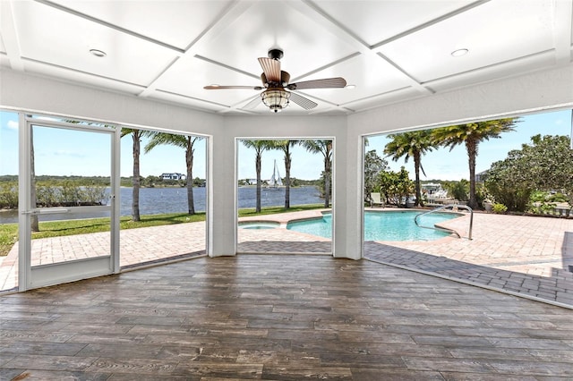 604 Springdale Dr, Flagler Beach, FL 32136 - unfurnished sunroom with coffered ceiling, a water view, and a swimming pool