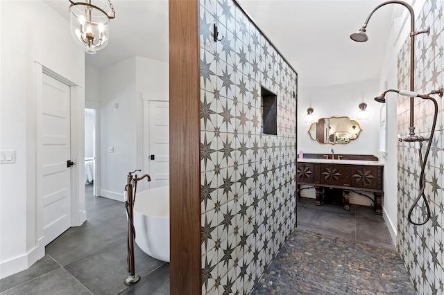 604 Springdale Dr, Flagler Beach, FL 32136 - bathroom with a freestanding bath, vanity, and baseboards
