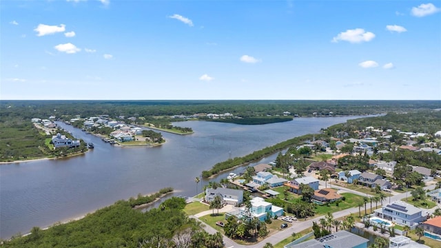 604 Springdale Dr, Flagler Beach, FL 32136 - aerial perspective of suburban area featuring a nearby body of water