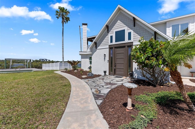 604 Springdale Dr, Flagler Beach, FL 32136 - view of front of property featuring a chimney