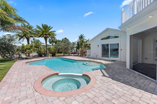 604 Springdale Dr, Flagler Beach, FL 32136 - view of swimming pool featuring a patio and a pool with connected hot tub