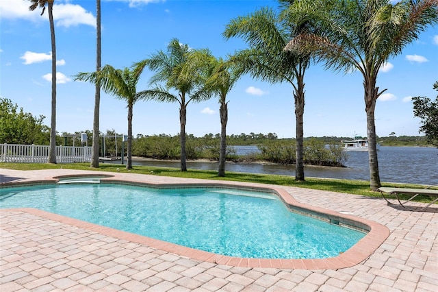 604 Springdale Dr, Flagler Beach, FL 32136 - swimming pool with a patio, an in-ground hot tub, and a water view