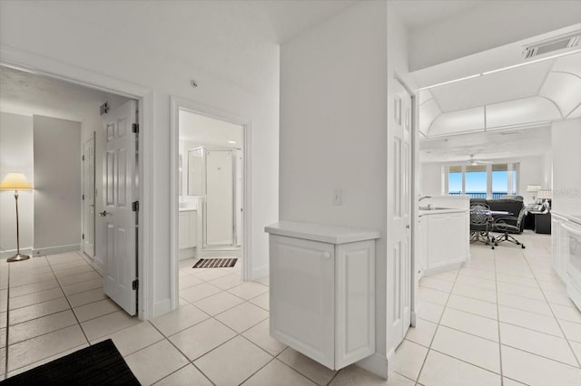 3425 S Atlantic Ave Unit 1602, Daytona Beach, FL 32118 - hall with light tile patterned flooring