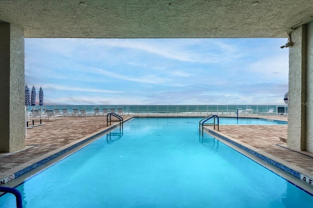 3425 S Atlantic Ave Unit 1602, Daytona Beach, FL 32118 - community pool with a patio