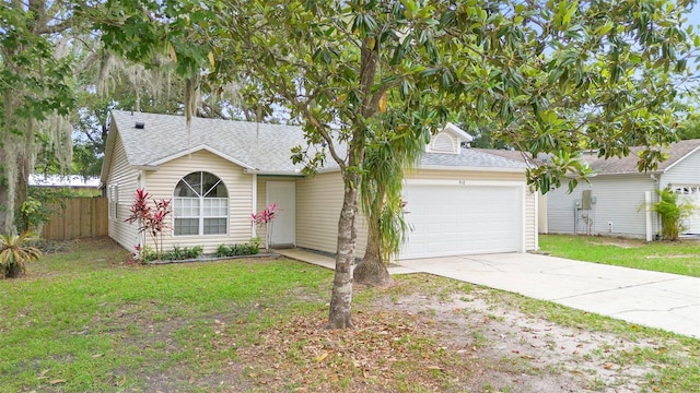 910 Sheeler Oaks Dr, Apopka, FL 32703 - view of front of house featuring an attached garage, concrete driveway, and a shingled roof