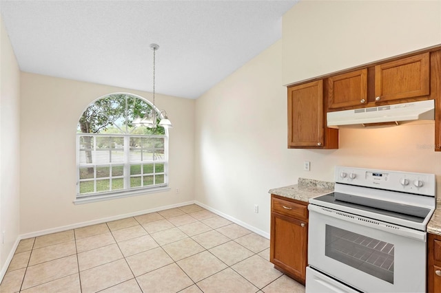 910 Sheeler Oaks Dr, Apopka, FL 32703 - kitchen with under cabinet range hood, white electric range oven, brown cabinets, baseboards, and decorative light fixtures