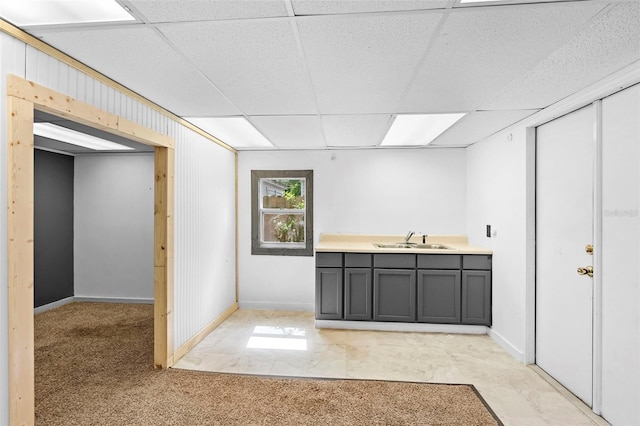 910 Sheeler Oaks Dr, Apopka, FL 32703 - bar featuring a sink, a paneled ceiling, and baseboards
