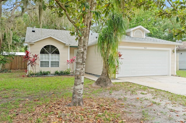 910 Sheeler Oaks Dr, Apopka, FL 32703 - view of front of house with an attached garage, concrete driveway, and a shingled roof