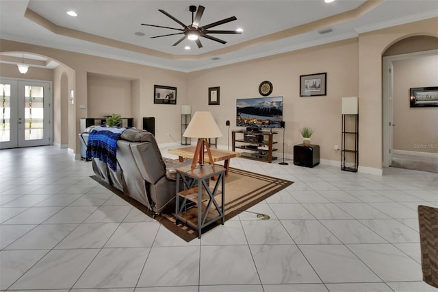 171 Birchmont Dr, Deland, FL 32724 - living area featuring arched walkways, a raised ceiling, ceiling fan, french doors, and recessed lighting