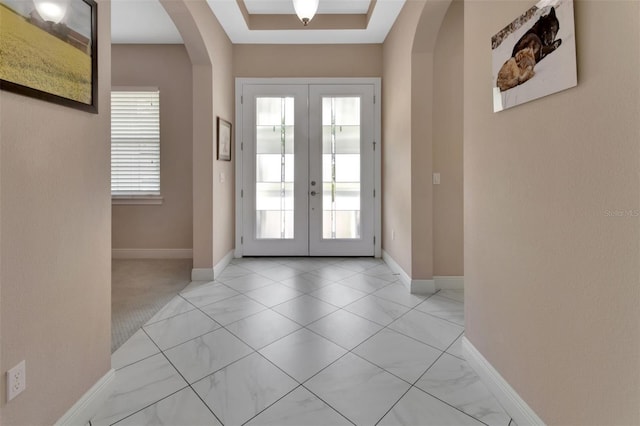 171 Birchmont Dr, Deland, FL 32724 - foyer with arched walkways, french doors, and baseboards