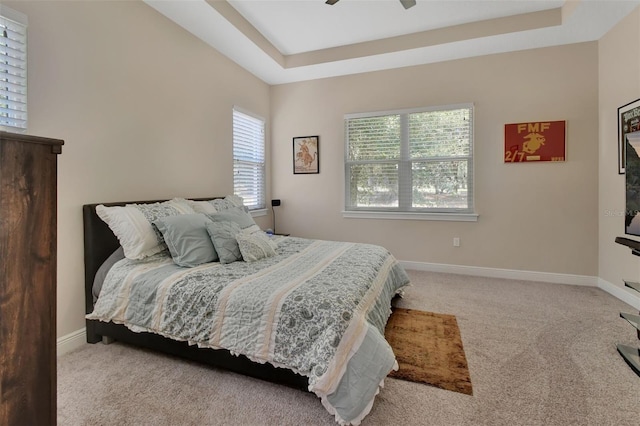 171 Birchmont Dr, Deland, FL 32724 - bedroom featuring carpet flooring, a raised ceiling, baseboards, and a ceiling fan