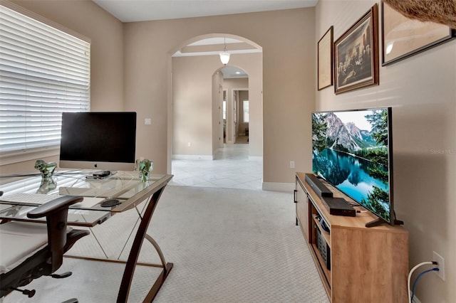 171 Birchmont Dr, Deland, FL 32724 - office space with arched walkways, light carpet, baseboards, and light tile patterned flooring