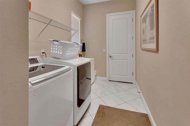171 Birchmont Dr, Deland, FL 32724 - laundry area with washer and dryer and baseboards