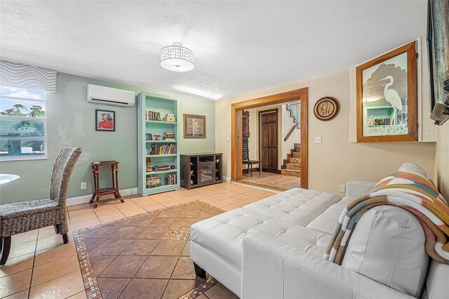 61 E Bayshore Dr, Port Orange, FL 32127 - living area featuring an AC wall unit, light tile patterned floors, stairs, and baseboards
