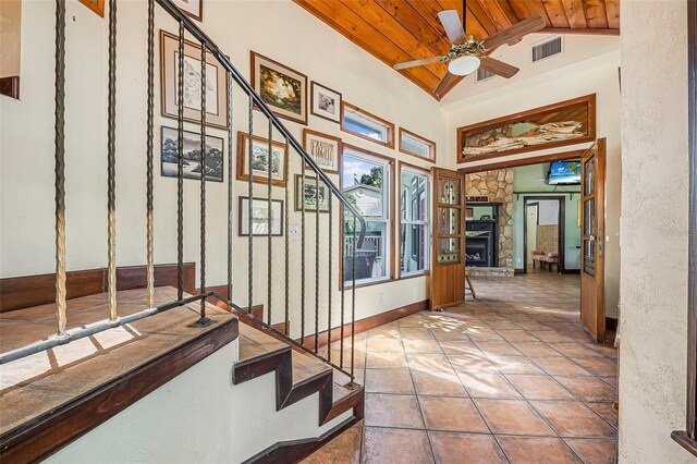 61 E Bayshore Dr, Port Orange, FL 32127 - corridor with wooden ceiling, vaulted ceiling, and stairway