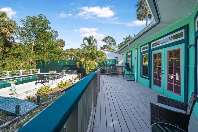 61 E Bayshore Dr, Port Orange, FL 32127 - deck featuring french doors