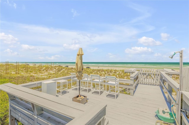 1209 N Atlantic Ave, New Smyrna Beach, FL 32169 - wooden deck with view of water and beach