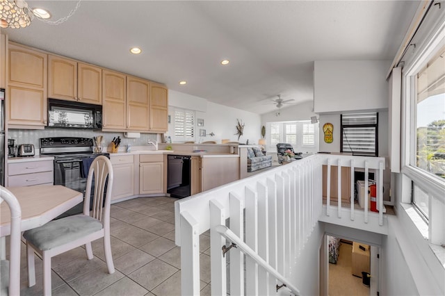 1209 N Atlantic Ave, New Smyrna Beach, FL 32169 - kitchen featuring black appliances, light brown cabinets, light countertops, ceiling fan, and tasteful backsplash