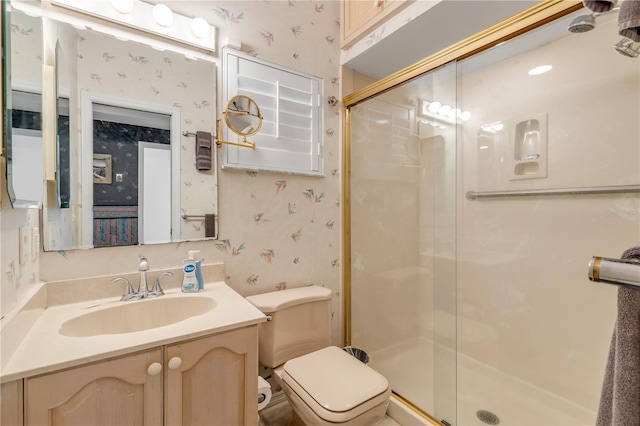 1209 N Atlantic Ave, New Smyrna Beach, FL 32169 - full bath featuring wallpapered walls, a stall shower, vanity, and toilet