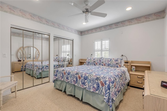 1209 N Atlantic Ave, New Smyrna Beach, FL 32169 - carpeted bedroom with two closets, recessed lighting, and a ceiling fan