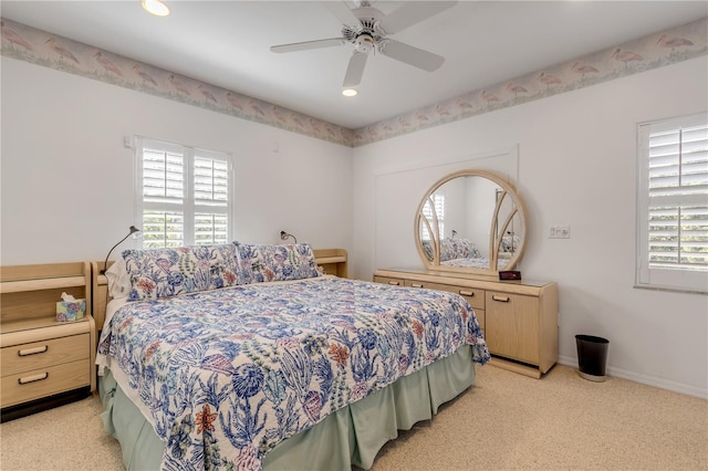 1209 N Atlantic Ave, New Smyrna Beach, FL 32169 - bedroom with light colored carpet, recessed lighting, baseboards, and ceiling fan