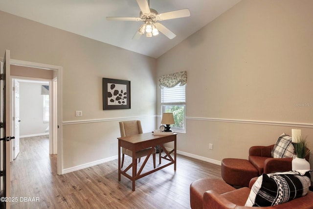 706 Fox Tail Ct, New Smyrna Beach, FL 32168 - office area featuring wood finished floors, baseboards, a ceiling fan, and high vaulted ceiling