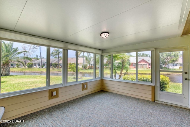 706 Fox Tail Ct, New Smyrna Beach, FL 32168 - unfurnished sunroom with a water view, carpet, and a residential view