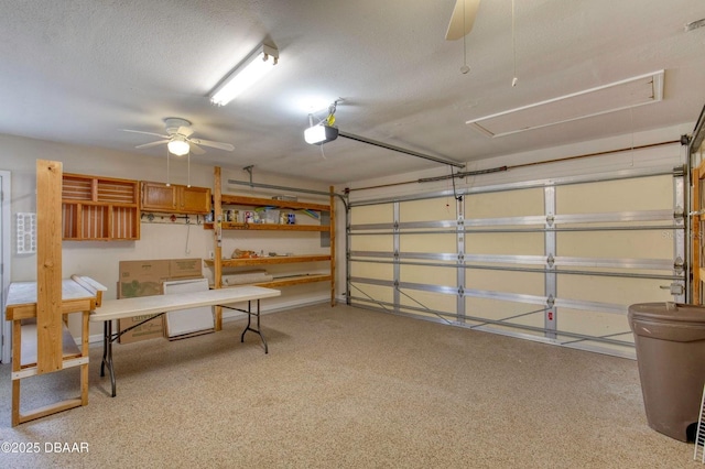 706 Fox Tail Ct, New Smyrna Beach, FL 32168 - garage featuring ceiling fan and a garage door opener