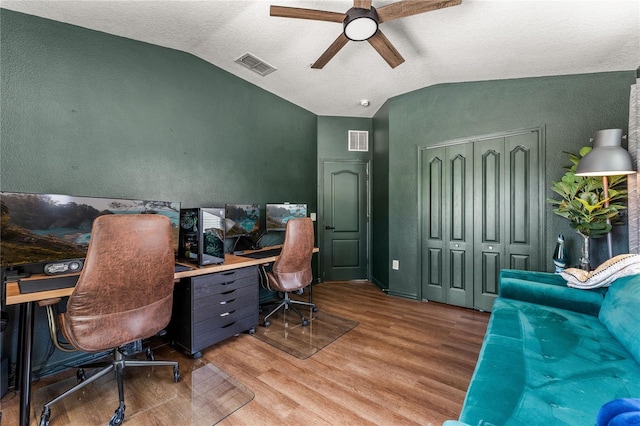 1469 Broken Oak Dr Unit 43A, Winter Garden, FL 34787 - office space featuring lofted ceiling, a ceiling fan, wood finished floors, and a textured wall