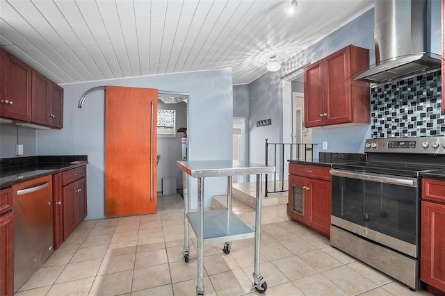 45 S University Cir, Deland, FL 32724 - kitchen featuring appliances with stainless steel finishes, wall chimney exhaust hood, light tile patterned flooring, wooden ceiling, and dark stone counters
