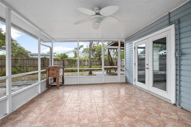 45 S University Cir, Deland, FL 32724 - unfurnished sunroom with a ceiling fan, french doors, and plenty of natural light