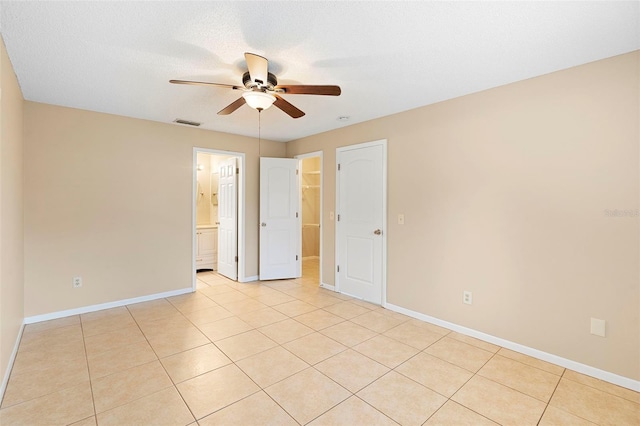 1204 Lawrence Ave, Deltona, FL 32725 - unfurnished room featuring ceiling fan, baseboards, and light tile patterned floors