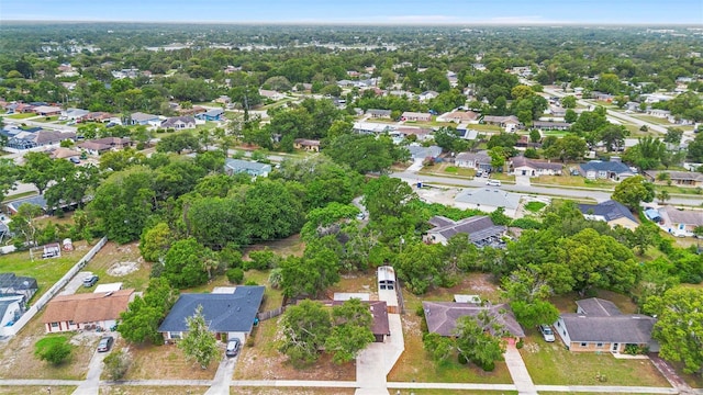 1204 Lawrence Ave, Deltona, FL 32725 - aerial overview of property's location featuring nearby suburban area