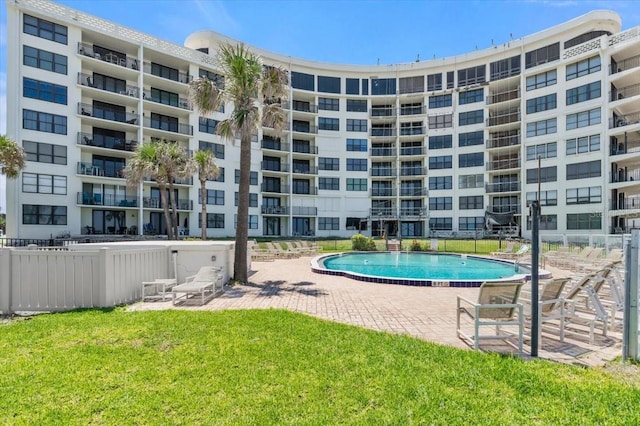 915 Ocean Shore Blvd Unit 8010, Ormond Beach, FL 32176 - community pool with a patio