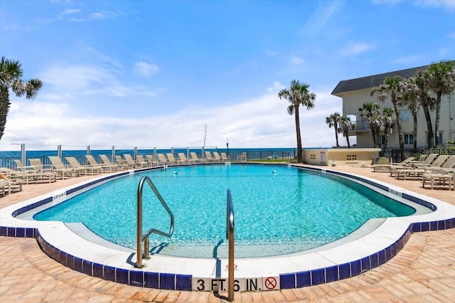 915 Ocean Shore Blvd Unit 8010, Ormond Beach, FL 32176 - community pool with a patio area