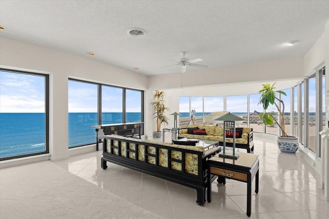 915 Ocean Shore Blvd Unit 8010, Ormond Beach, FL 32176 - sunroom featuring a water view