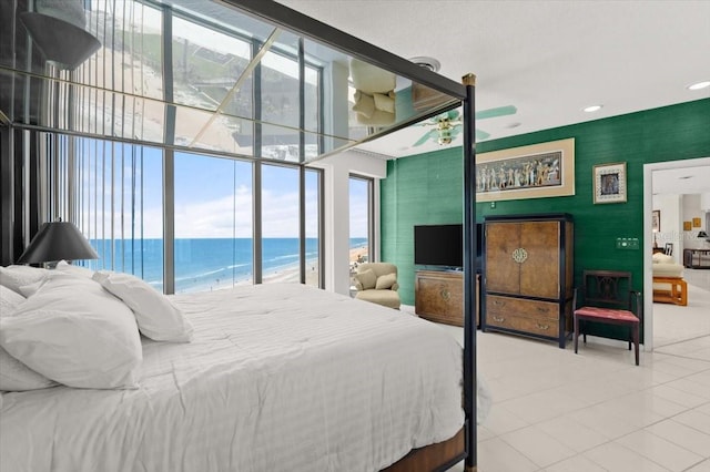 915 Ocean Shore Blvd Unit 8010, Ormond Beach, FL 32176 - bedroom with tile patterned floors and multiple windows