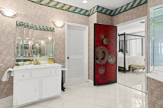 915 Ocean Shore Blvd Unit 8010, Ormond Beach, FL 32176 - full bathroom with vanity, tile patterned flooring, and ensuite bathroom