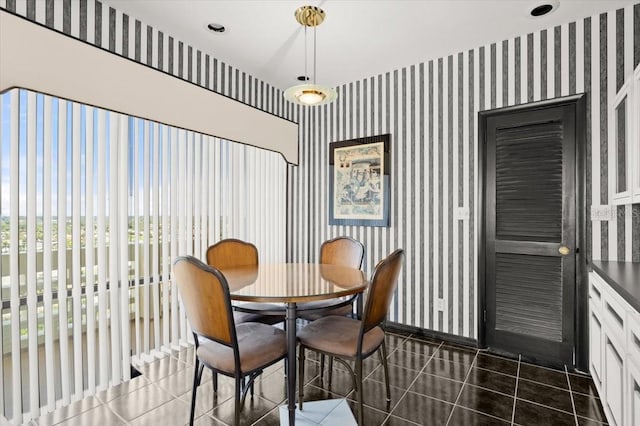 915 Ocean Shore Blvd Unit 8010, Ormond Beach, FL 32176 - dining room featuring wallpapered walls, tile patterned flooring, and baseboards