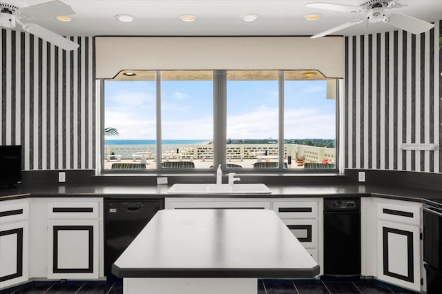 915 Ocean Shore Blvd Unit 8010, Ormond Beach, FL 32176 - kitchen featuring a sink, ceiling fan, wallpapered walls, dishwasher, and dark tile patterned flooring