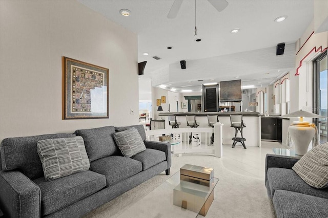 915 Ocean Shore Blvd Unit 8010, Ormond Beach, FL 32176 - living area featuring recessed lighting, ceiling fan, and light colored carpet